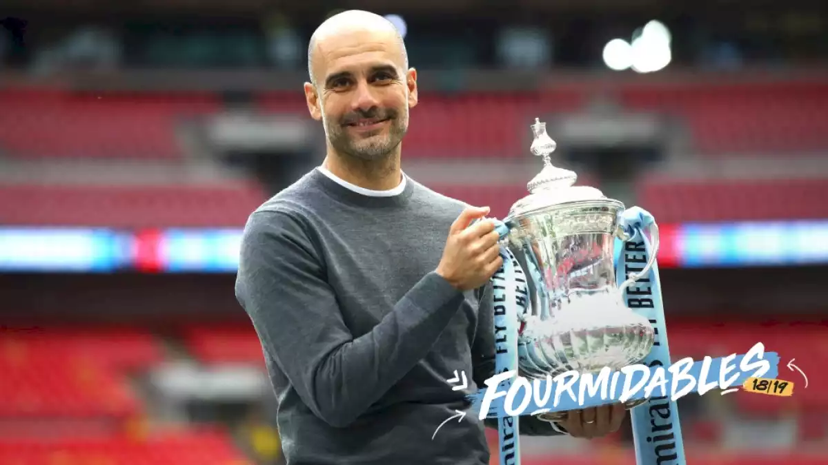 Pep Guardiola celebra els quatre títols del Manchester City aconseguits aquesta temporada