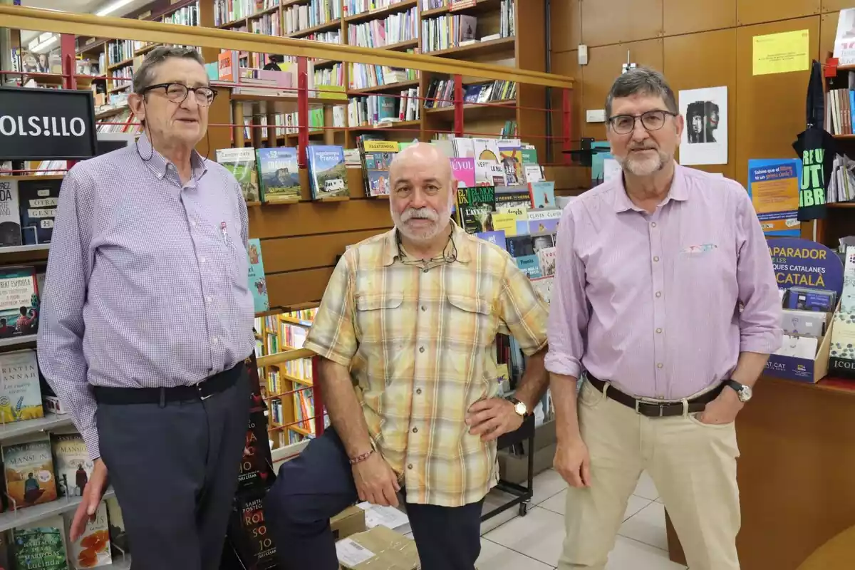 Ricard Espinosa, Josep Rovira i Pau Espinosa, copropietaris de la llibreria La Capona