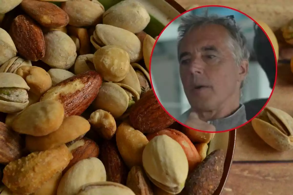 A plate full of assorted nuts with the image of a gray-haired man in a circle overlaid in the top right corner.