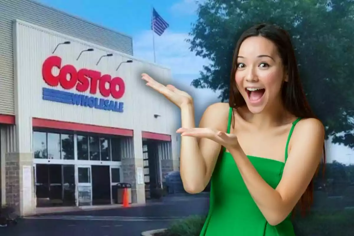 Smiling woman in a green dress enthusiastically pointing at the entrance of a Costco Wholesale store