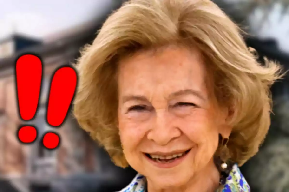 Photo montage of Queen Sofía with a smiling face in the foreground and two red exclamation marks next to her.