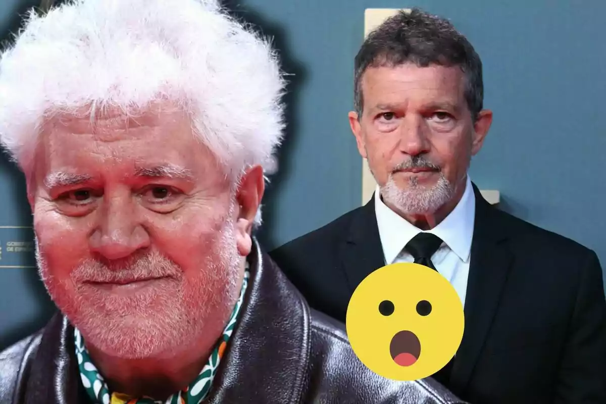 Pedro Almodóvar and Antonio Banderas pose at a formal event, one of them wearing a leather jacket and the other a black suit, with a surprised face emoji superimposed on the image.