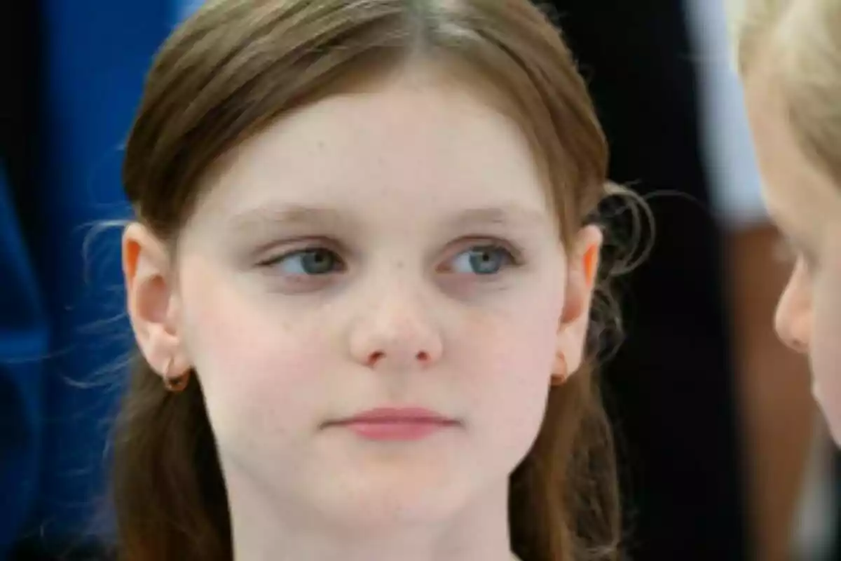Princess Gabriella of Monaco looking to the side with a serious expression. Princess Gabriella of Monaco looking to the side with a serious expression.