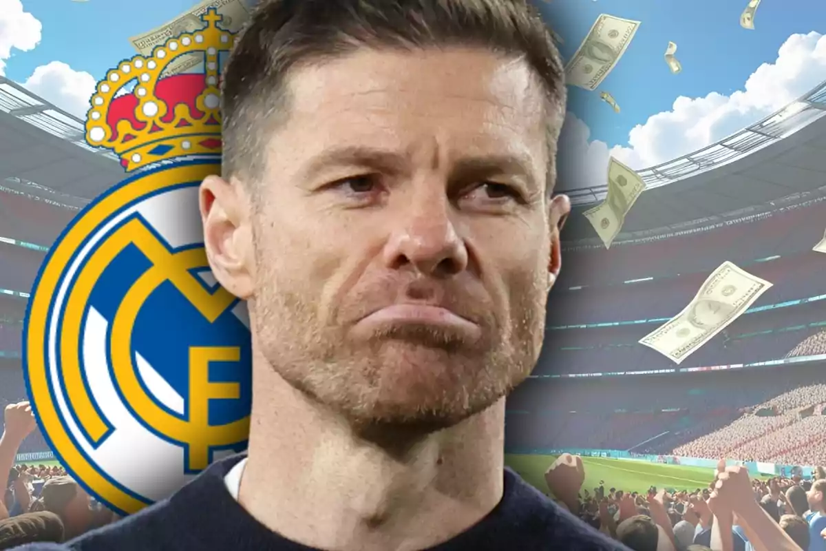 Man with a serious expression in front of the Real Madrid crest in a stadium with flying bills and cheering crowd.