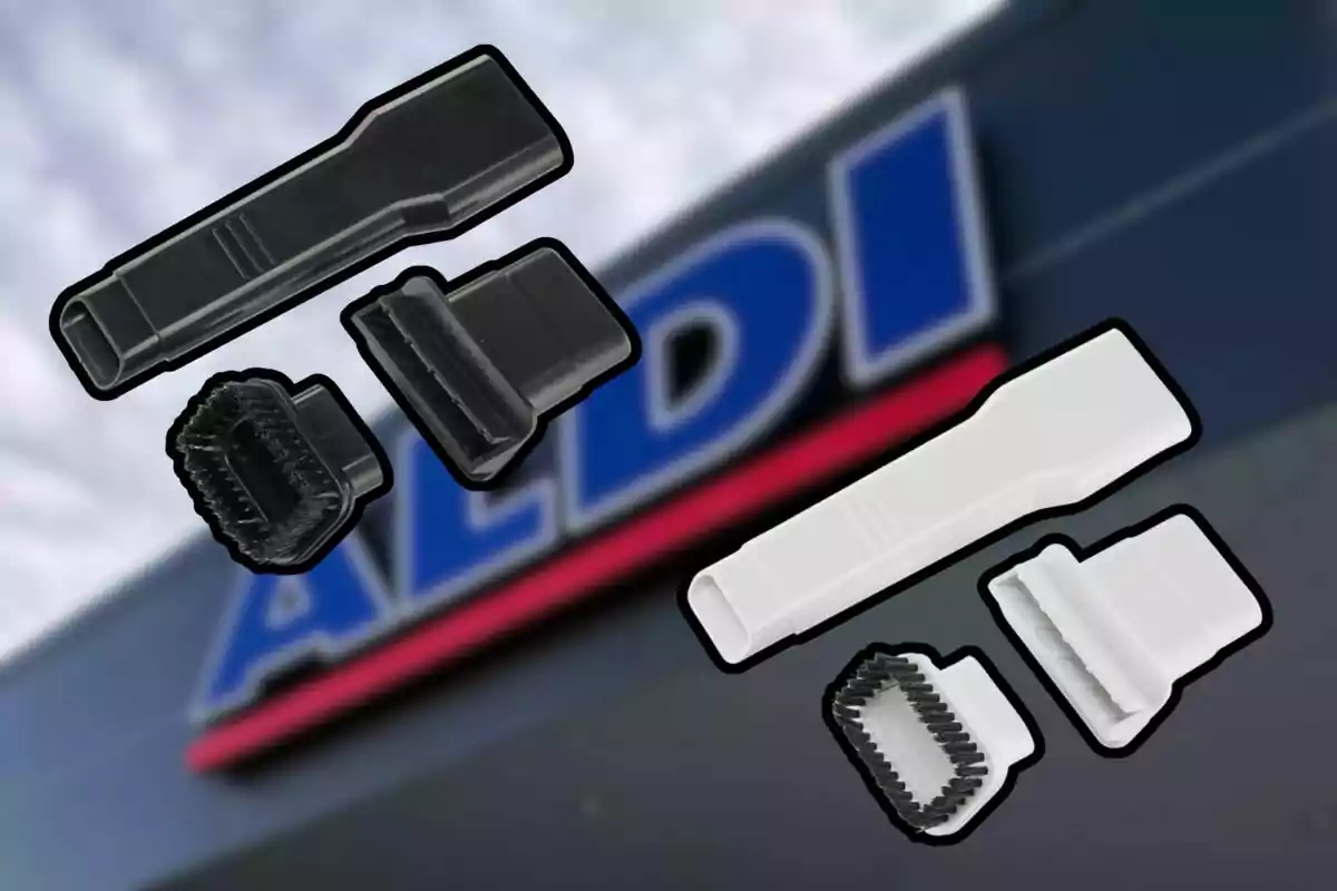 Accesorios de aspiradora en color negro y blanco sobre un fondo desenfocado con el logo de una tienda Aldi Accesorios de aspiradora en color negro y blanco sobre un fondo desenfocado con el logo de una tienda Aldi