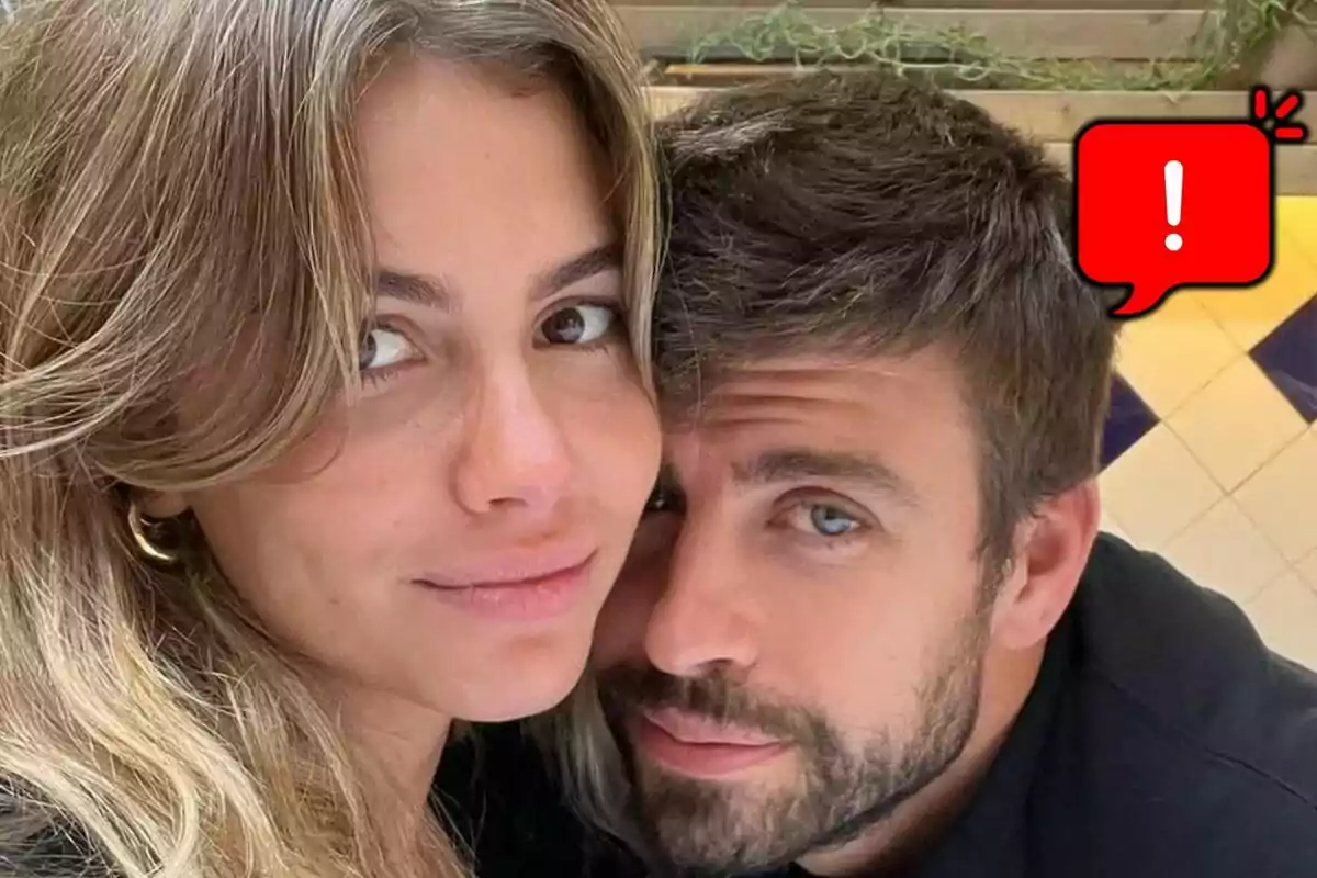 Young couple—Clara Chía and Gerard Piqué—posing together with a red warning bubble in the upper right corner.