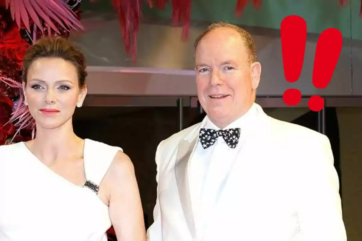 Charlene and Albert of Monaco dressed in formal attire with a decorative red background and two large red exclamation marks on the right