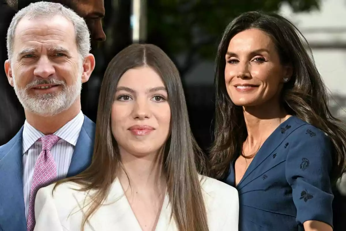 Felip VI, la infanta Sofia i la reina Letícia posen somrients a l’aire lliure, un home de barba canosa amb vestit blau, una jove de cabell llarg i llis amb jaqueta blanca i una dona de cabell castany fosc amb vestit blau.