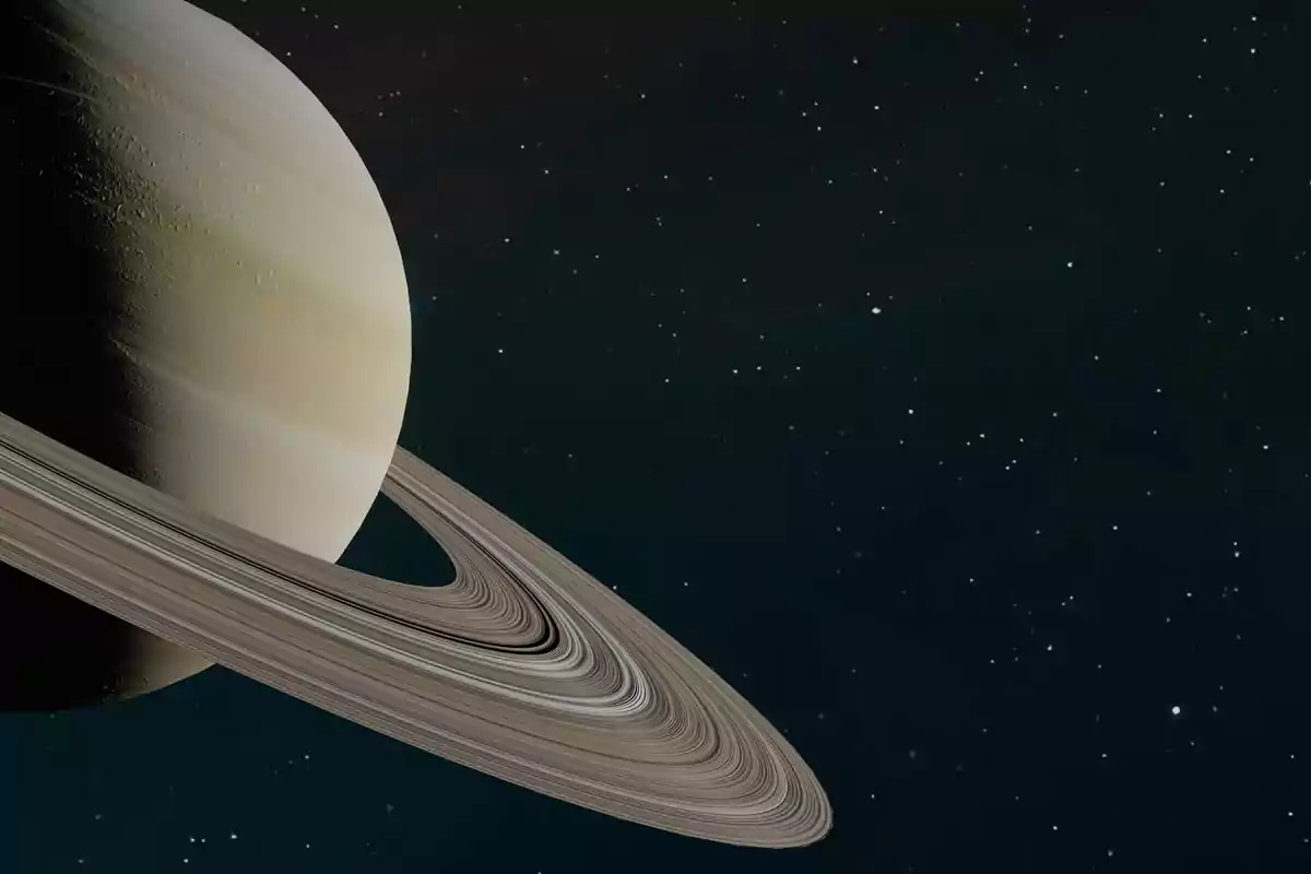 Planet Saturn with its rings visible in the starry space Planet Saturn with its rings visible in the starry space