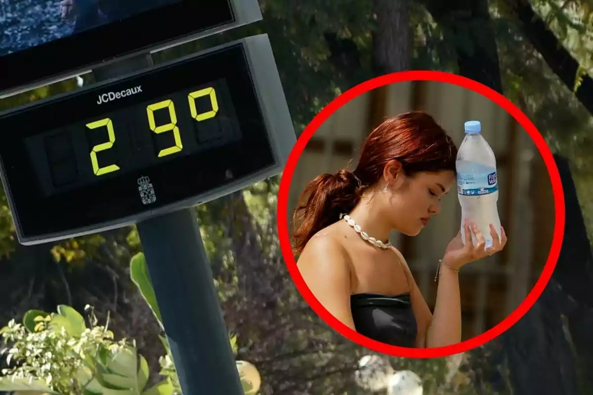 Un termòmetre al carrer marca 29 graus mentre una dona es refresca amb una ampolla d’aigua al front.