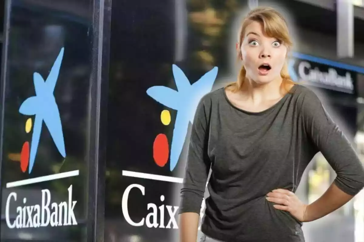 Dona amb expressió de sorpresa davant d’una sucursal de CaixaBank