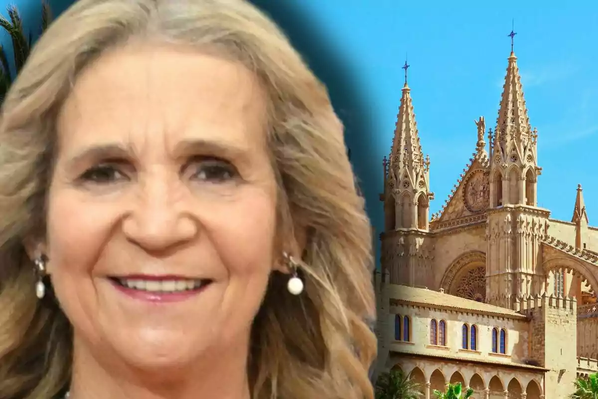 Infanta Elena, smiling with blonde hair, with a cathedral in the background under a blue sky