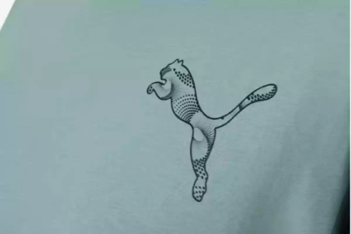 Logotip d’un felí saltant amb disseny de punts sobre tela de color verd clar