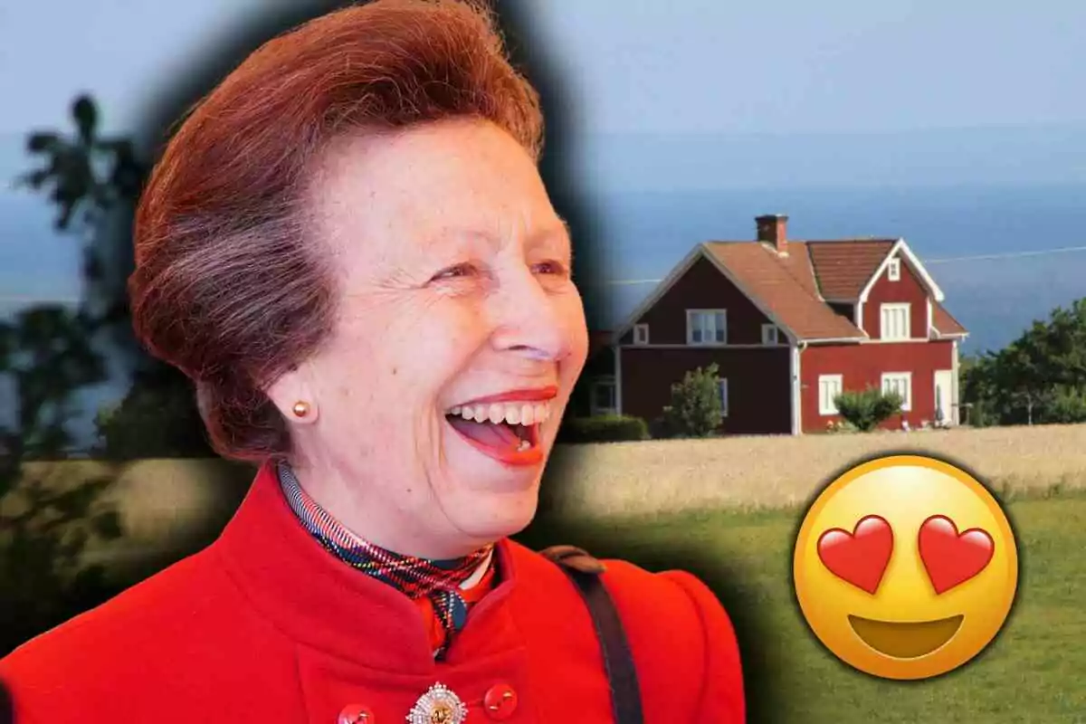 La princesa Ana sonriente con abrigo rojo frente a una casa de campo y un emoji de cara enamorada La princesa Ana sonriente con abrigo rojo frente a una casa de campo y un emoji de cara enamorada