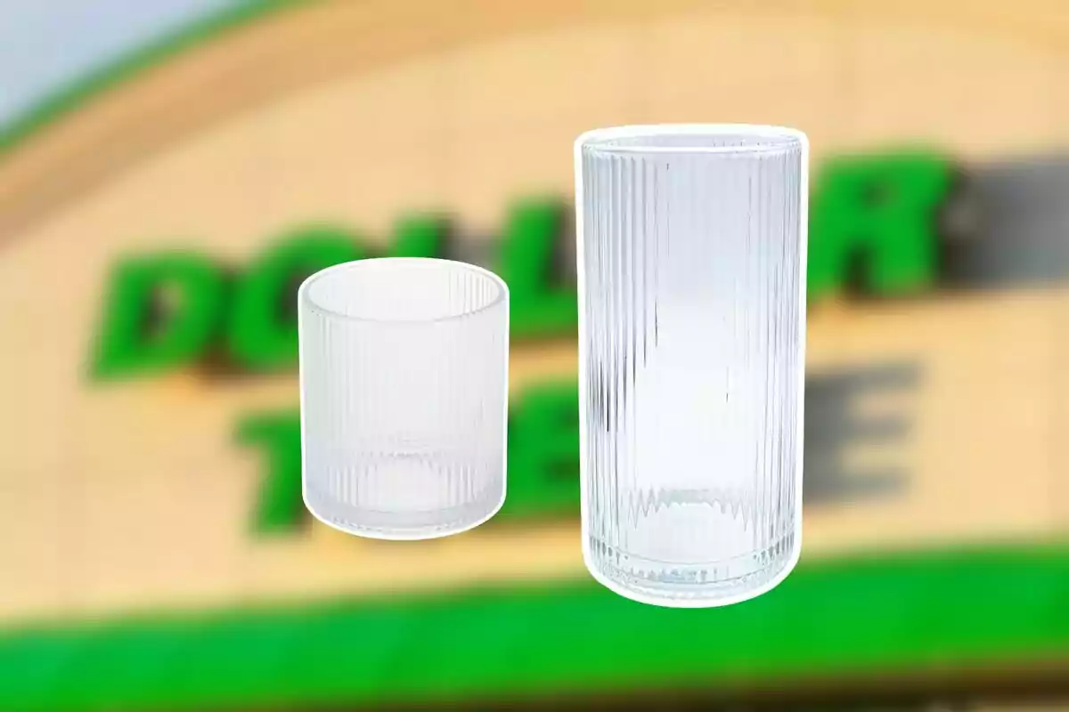 Two clear ribbed glass cups in front of a blurry Dollar Tree sign Two clear ribbed glass cups in front of a blurry Dollar Tree sign