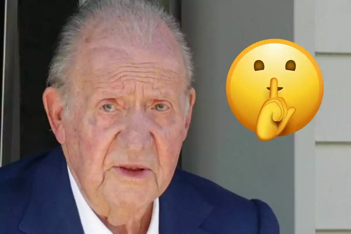 Juan Carlos I with a serious expression and a silence emoji next to his face