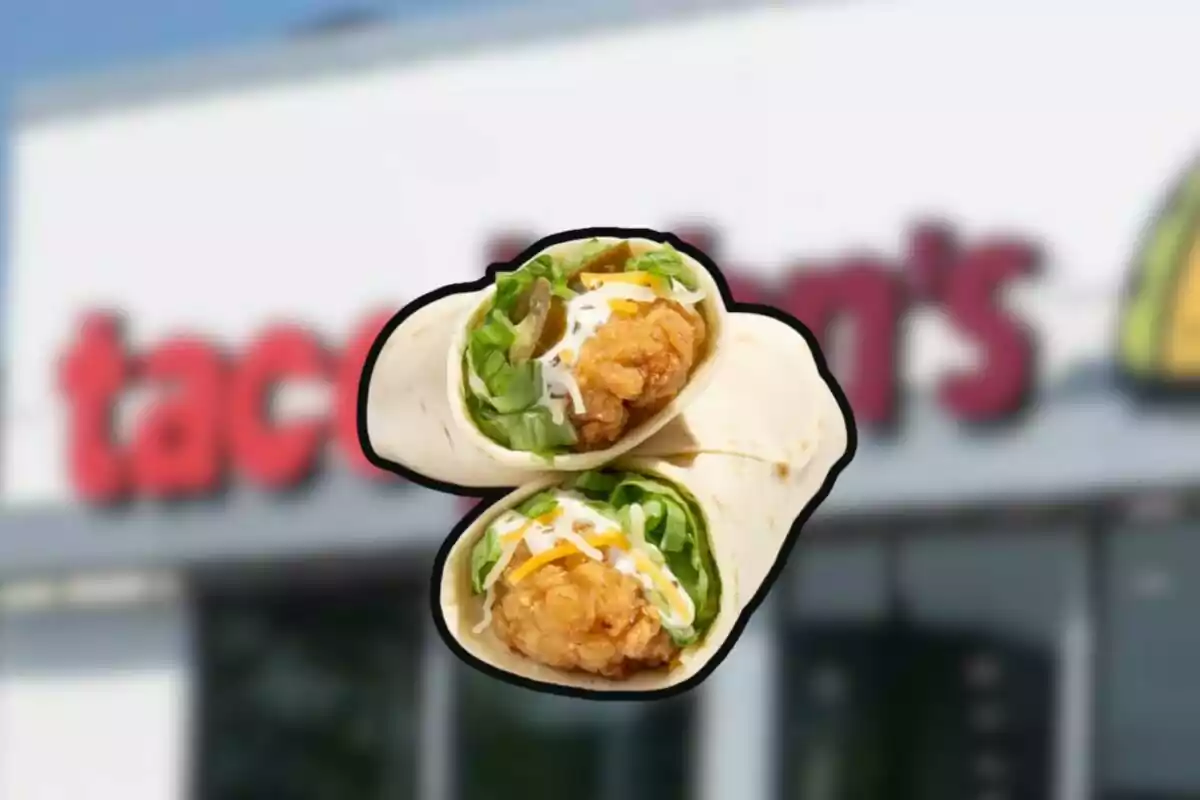 Two burritos filled with breaded chicken, lettuce, and cheese in front of a fast food restaurant.