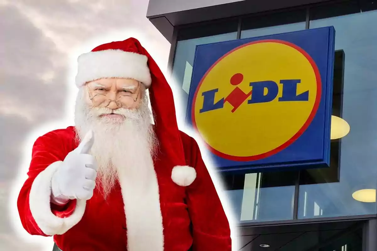 Santa Claus sonriente haciendo un gesto de aprobación con el pulgar levantado junto a la fachada de una tienda Lidl.