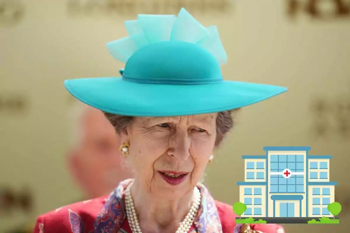 Anna del Regne Unit amb barret blau i una icona d'hospital a la part inferior dreta.