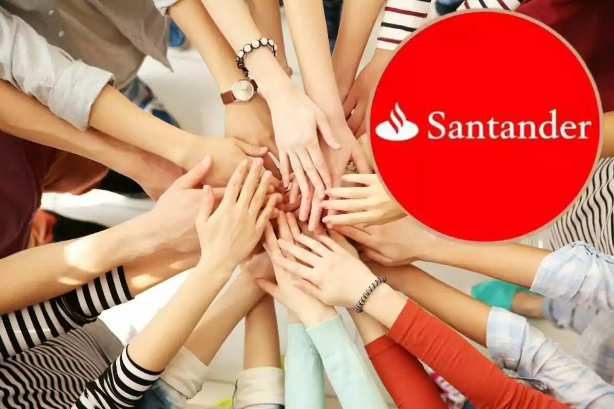 Un grup de mans unides al centre amb un logotip vermell de Santander a la cantonada.