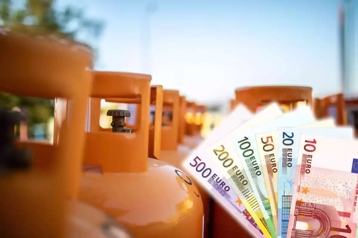 Muntatge de bombones de butà en fila i bitllets d'euro