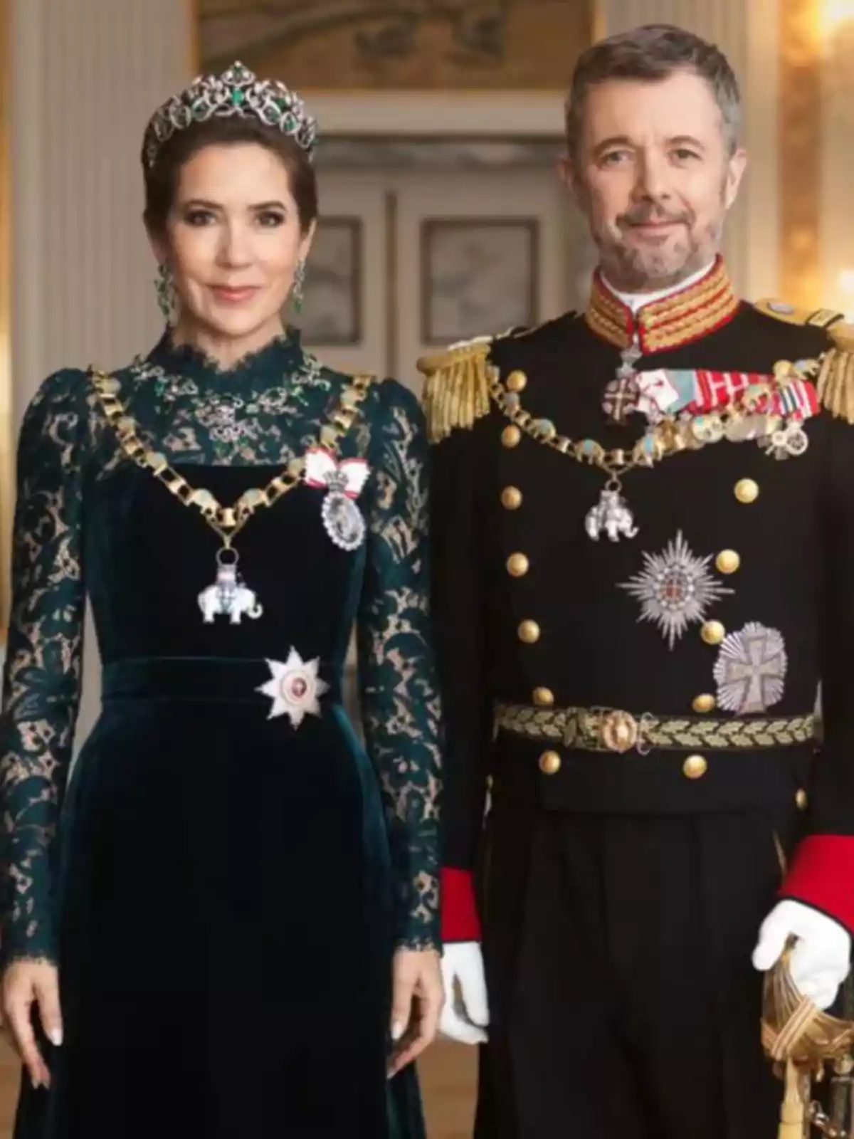 Mary and Frederik of Denmark dressed in formal attire and decorations in an elegant setting Mary and Frederik of Denmark dressed in formal attire and decorations in an elegant setting