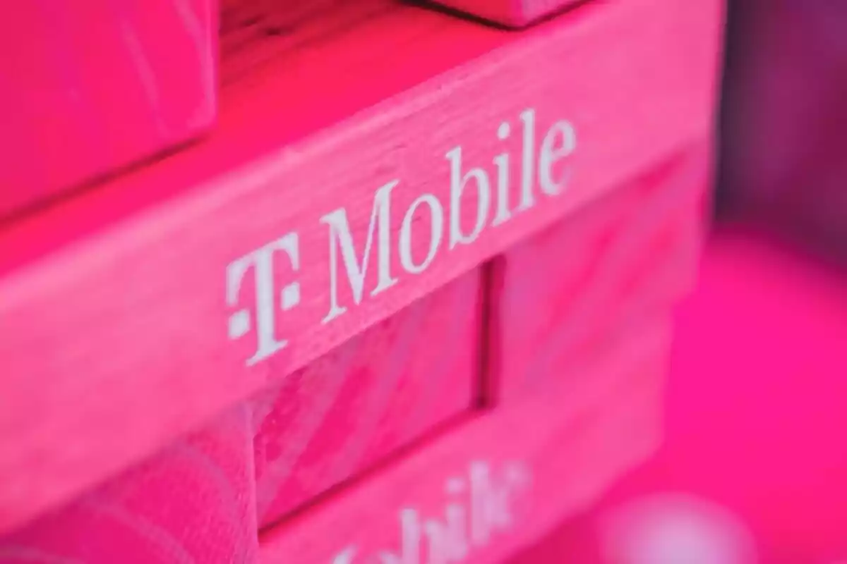 Pink-painted wooden boxes with the T-Mobile logo in white. Pink-painted wooden boxes with the T-Mobile logo in white.