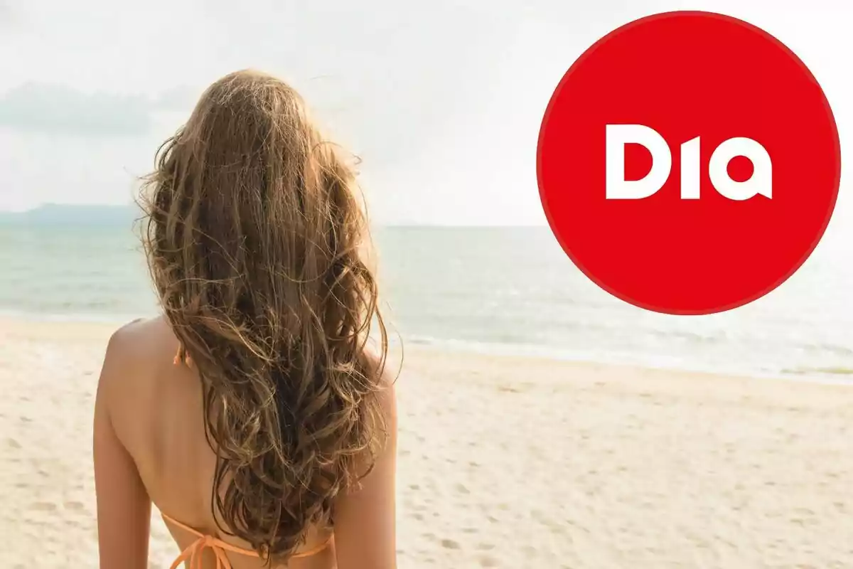 Dona d’esquena a la platja amb el logotip de Dia en un cercle vermell a la cantonada superior dreta