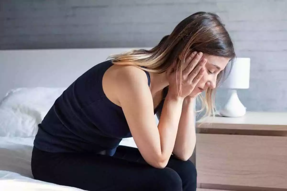 Woman with hands on face and thinking Woman with hands on face and thinking