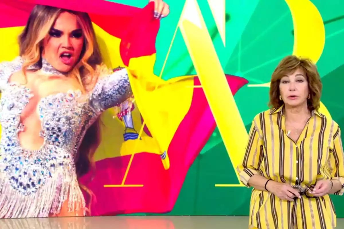 Ana Rosa Quintana està dreta davant d'una pantalla que mostra a Melody amb un vestit brillant i una bandera d'Espanya. Captura de 'El Programa de AR' Ana Rosa Quintana està dreta davant d'una pantalla que mostra a Melody amb un vestit brillant i una bandera d'Espanya. Captura de 'El Programa de AR'