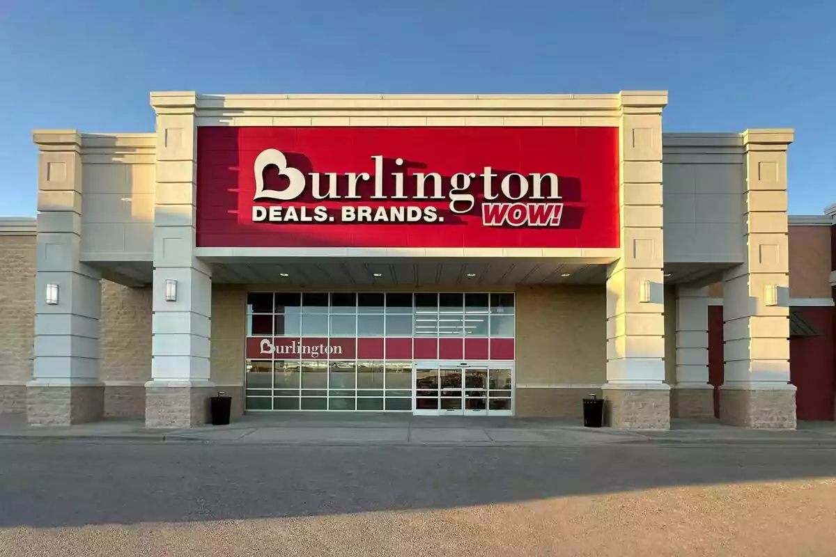 Storefront with a large red and white sign. Storefront with a large red and white sign.