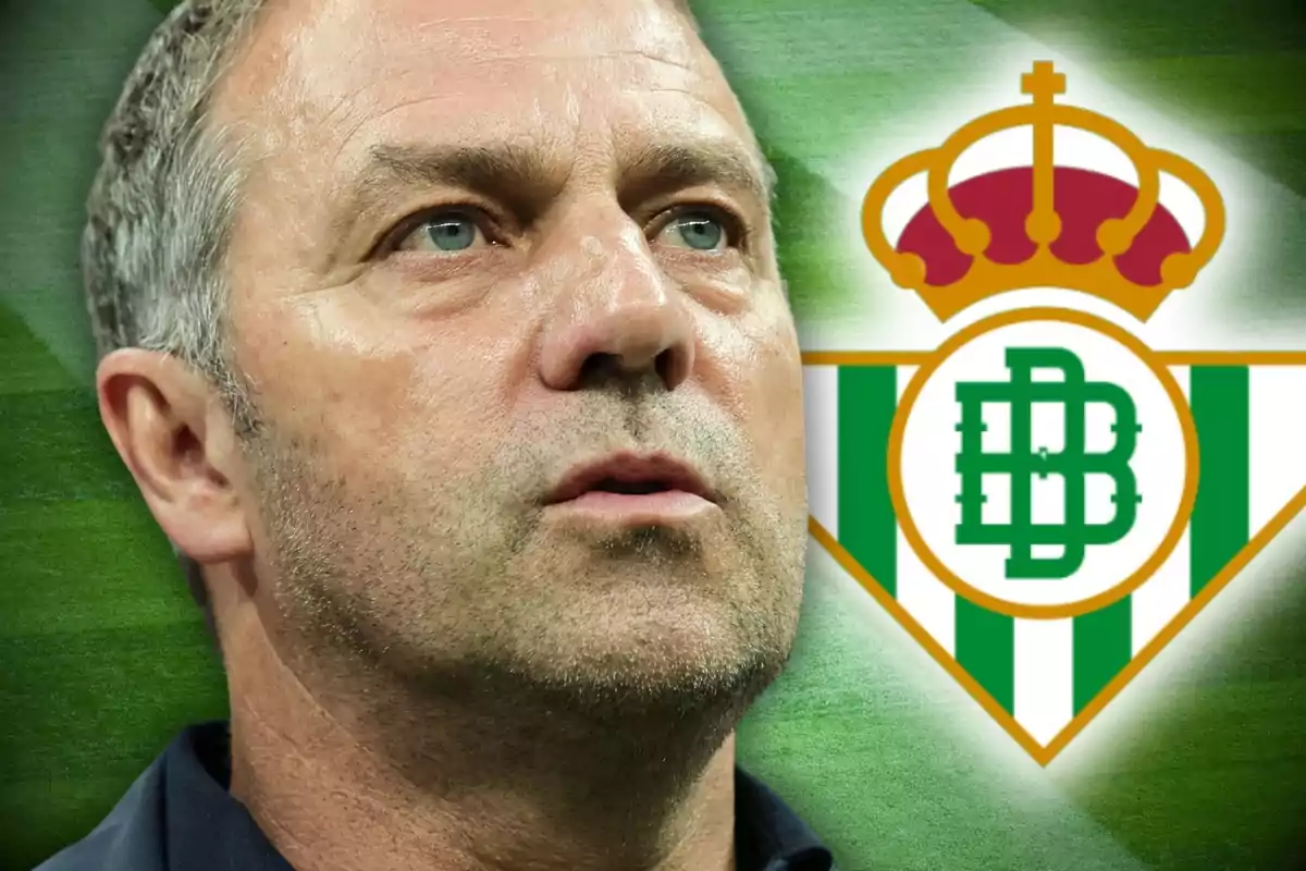 A man with a serious expression in front of the Real Betis shield.