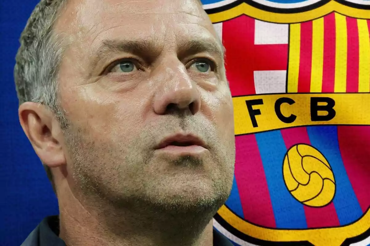 Hansi Flick with the FC Barcelona shield in the background