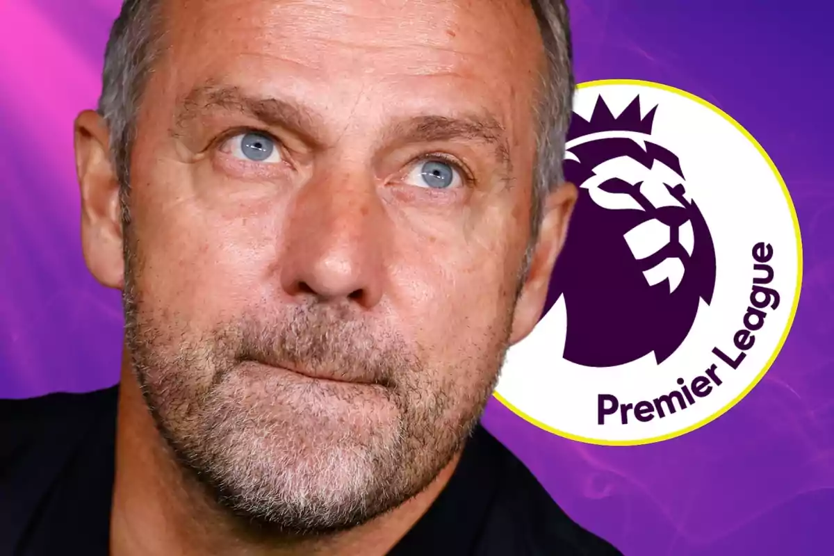 A gray-haired man with a beard looks up with the Premier League logo in the background.