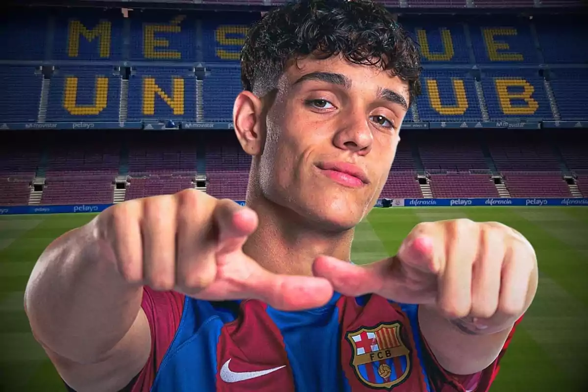 A young FC Barcelona footballer poses at the Camp Nou stadium, with the phrase 