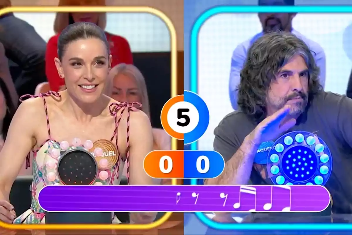Raquel Sánchez Silva i J. J. Vaquero participen a 'Pasapalabra', cadascun amb un polsador lluminós davant seu i un marcador al centre que mostra el número cinc i la puntuació a zero per a tots dos. Raquel Sánchez Silva i J. J. Vaquero participen a 'Pasapalabra', cadascun amb un polsador lluminós davant seu i un marcador al centre que mostra el número cinc i la puntuació a zero per a tots dos.