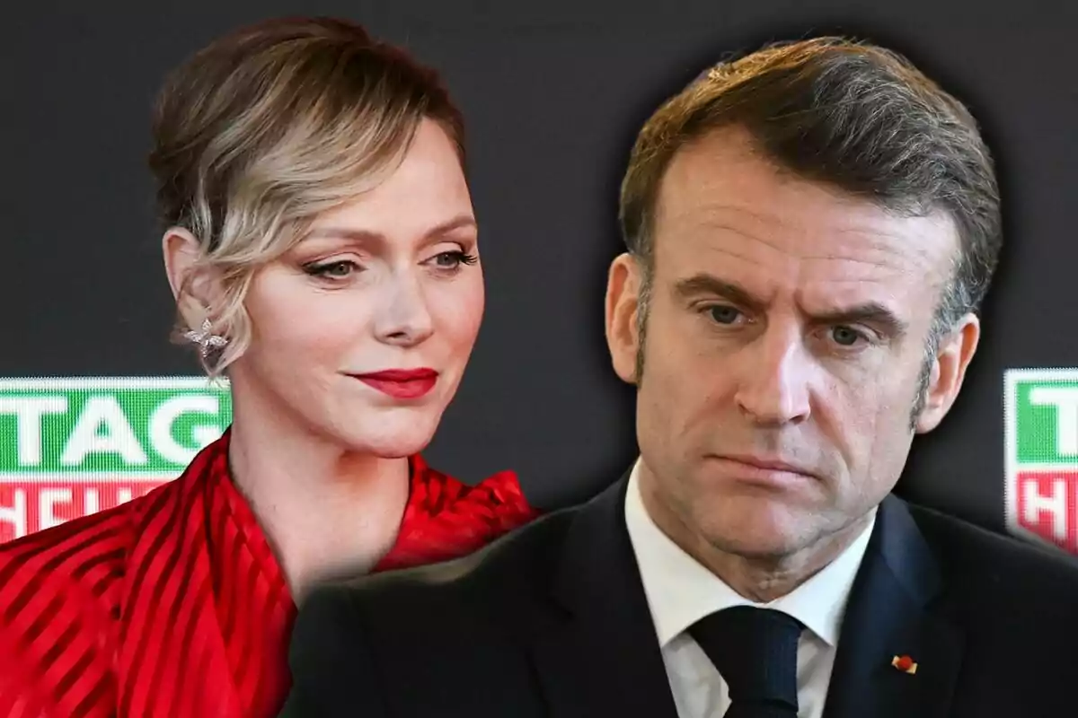 A woman in a red dress and a man in a dark suit pose together in front of a black background with green and red logos.