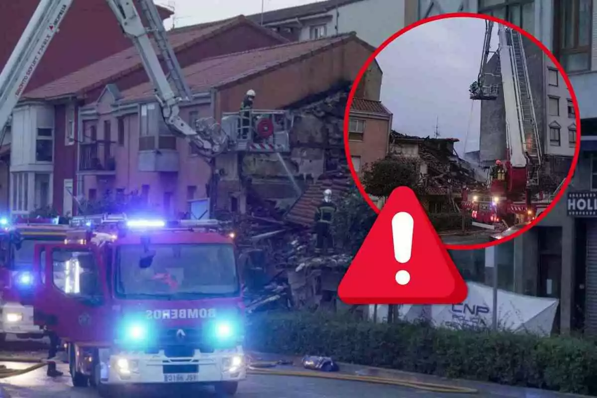 Camions de bombers i personal d'emergència treballant al lloc d'un edifici a Santander parcialment col·lapsat.