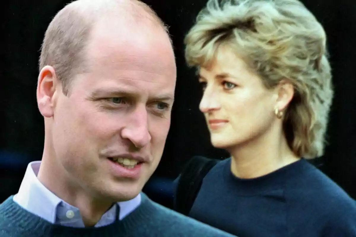 A bald man in a dark sweater in the foreground and a blonde woman with short hair in the background.