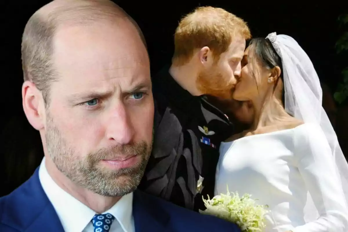 A man with a serious expression in the foreground and a couple kissing in the background during a wedding.