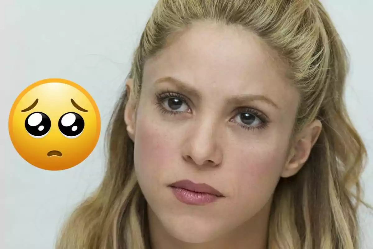 Blonde-haired woman with a serious expression next to a sad face emoji