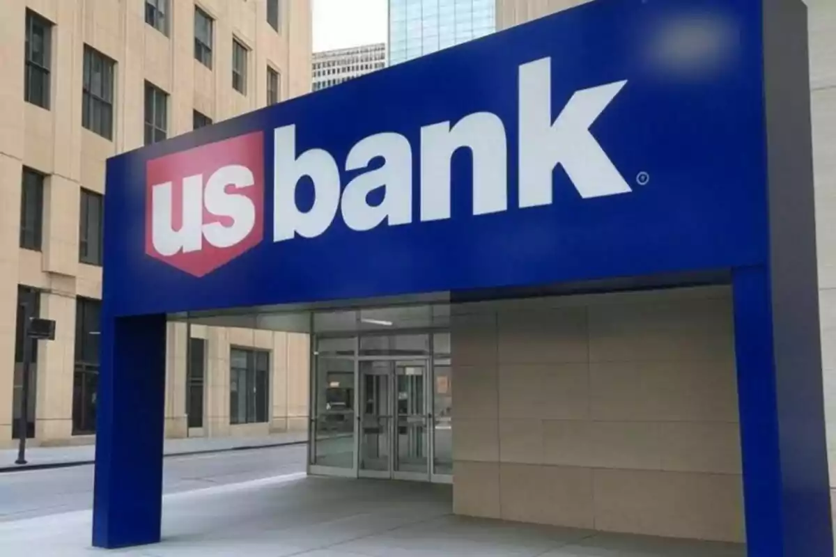 Entrance of a bank with a blue sign that says Entrance of a bank with a blue sign that says