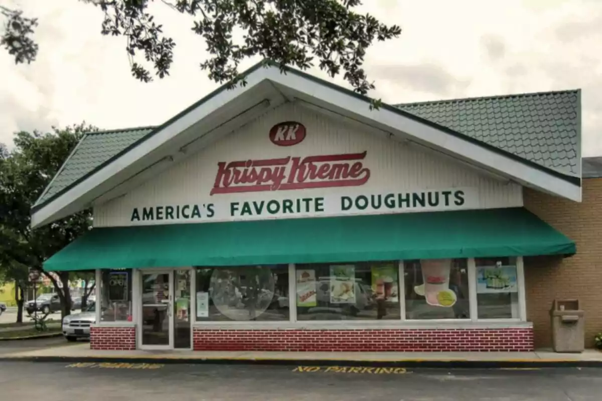 Facade of a Krispy Kreme store with a sign that says Facade of a Krispy Kreme store with a sign that says