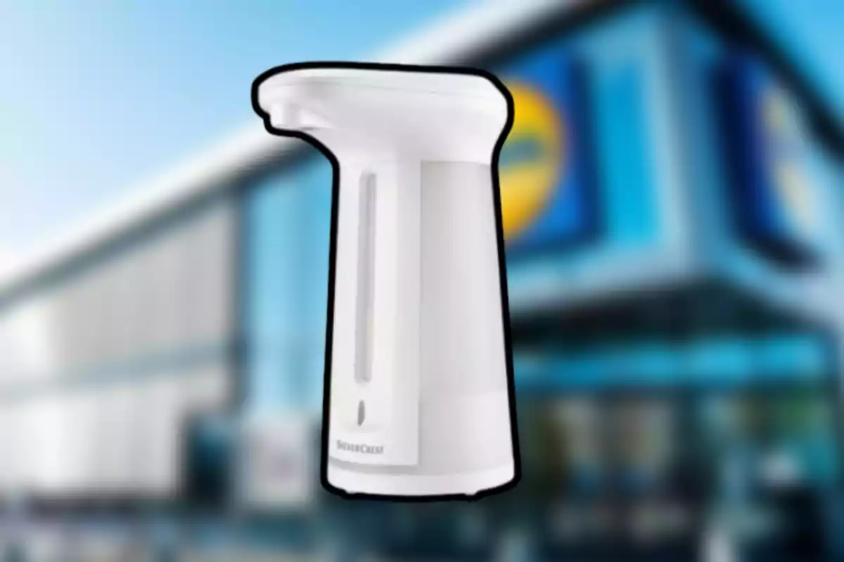 Dispensador automàtic de sabó blanc amb fons de botiga desenfocat Dispensador automàtic de sabó blanc amb fons de botiga desenfocat