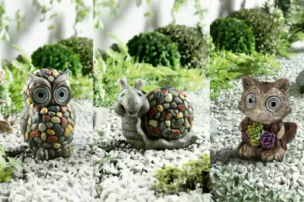 Tres figures d’animals fetes de pedres petites i ciment estan col·locades sobre grava blanca en un jardí amb plantes verdes al fons. Tres figures d’animals fetes de pedres petites i ciment estan col·locades sobre grava blanca en un jardí amb plantes verdes al fons.