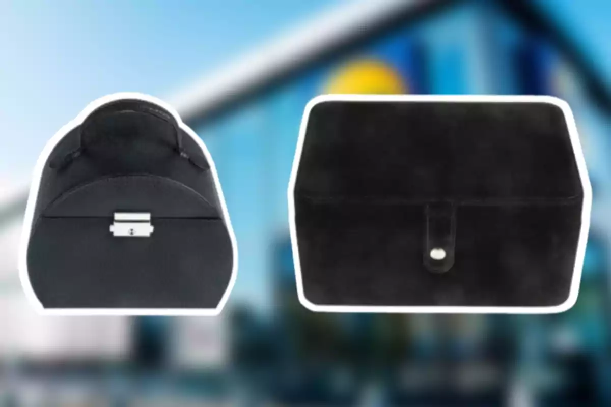 Dos bolsos negres sobre un fons desenfocat. Dos bolsos negres sobre un fons desenfocat.