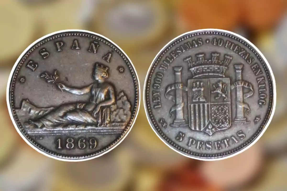 Moneda de 5 pessetes d'Espanya del 1869 amb disseny d'una figura femenina i escut.