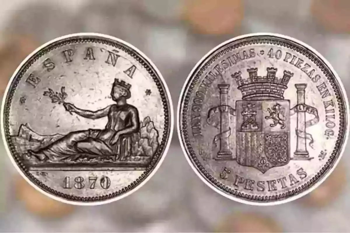 Moneda espanyola de 5 pessetes del 1870 amb figura femenina i escut d'armes.