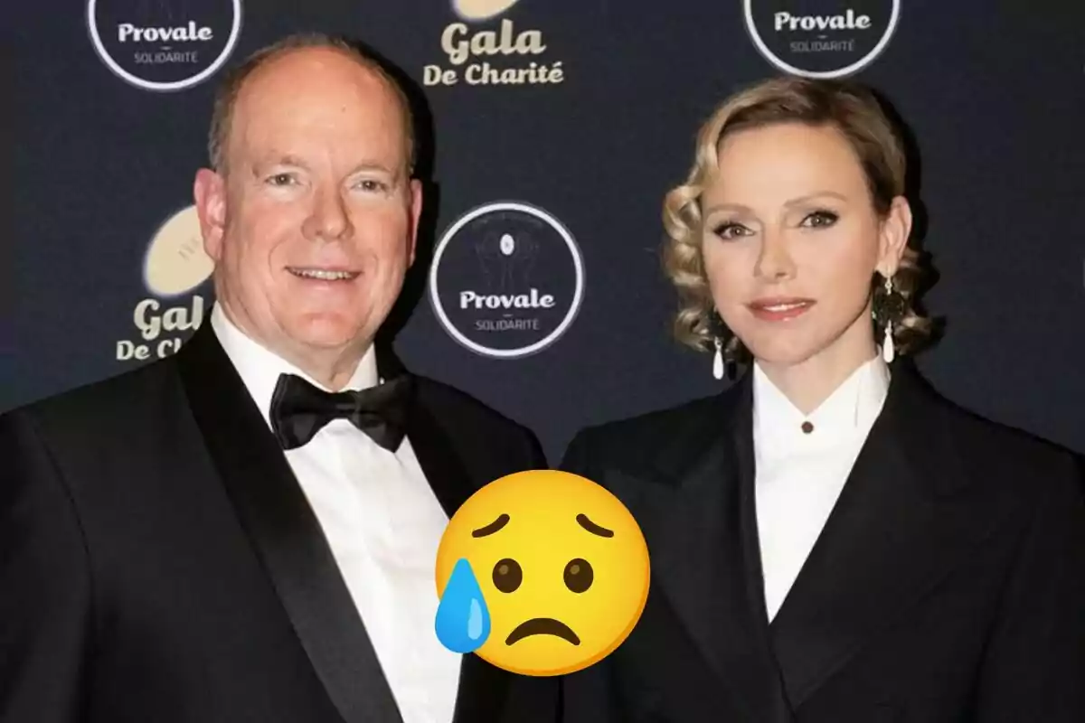 Albert of Monaco and Charlene dressed in formal attire posing at an event with a sad face emoji and a tear over the image