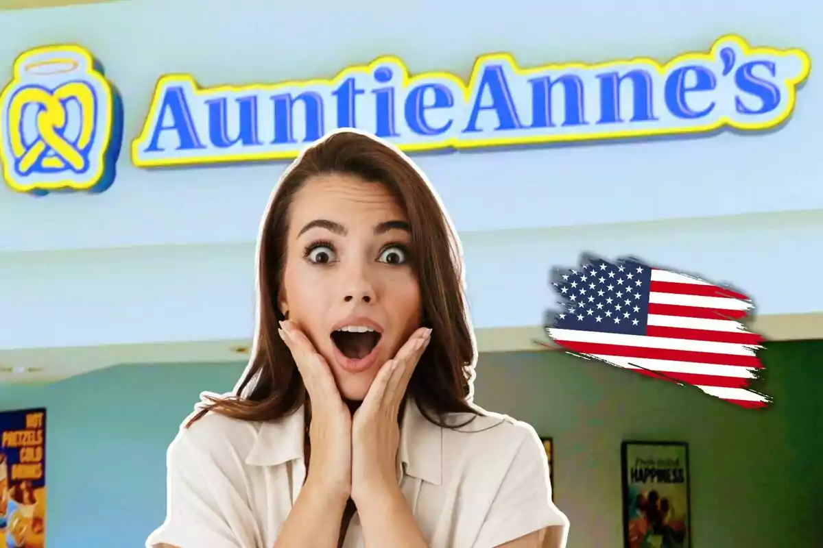 Surprised woman in front of an Auntie Anne's store with a United States flag in the background